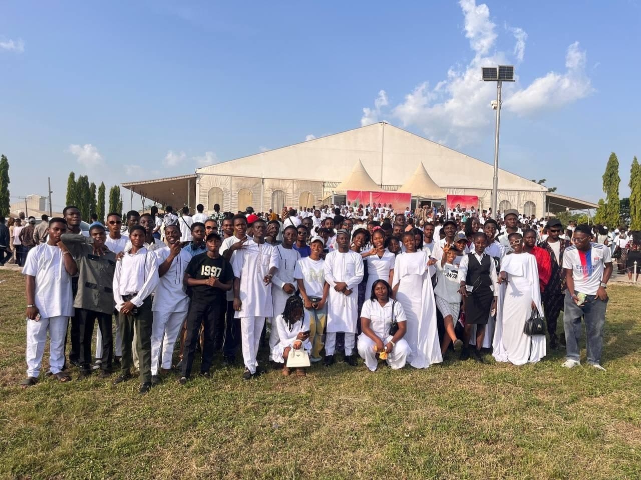 Members of Accelerator Community dressed in white at a gathering